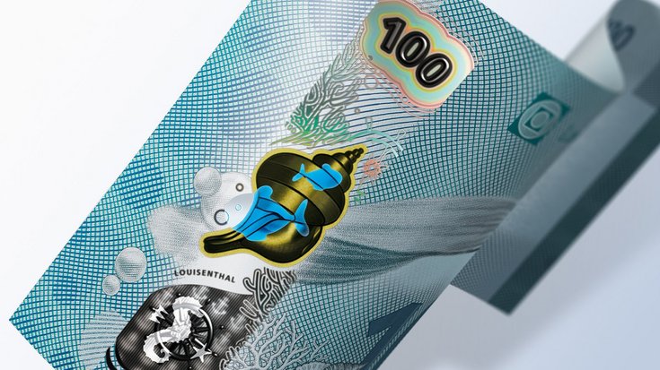 Close-up of a banknote with security window and other visual effects