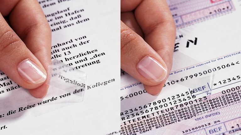 Comparison of two attempts to remove printed text from a document with an adhesive strip