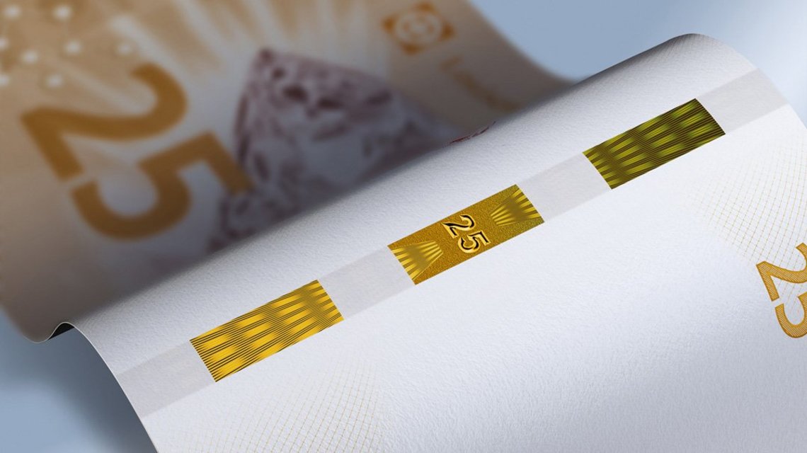 Close-up of a Rollingstar security thread on a specimen banknote