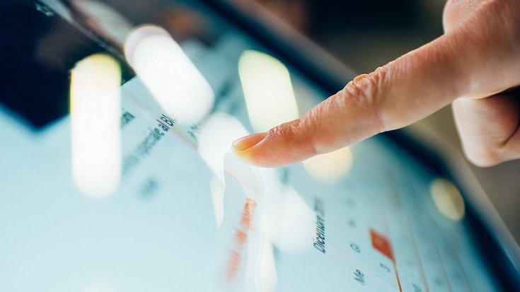 Finger touching a touchscreen