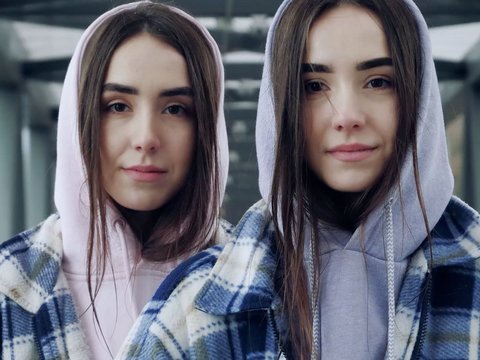 Identical female twins with same clothes