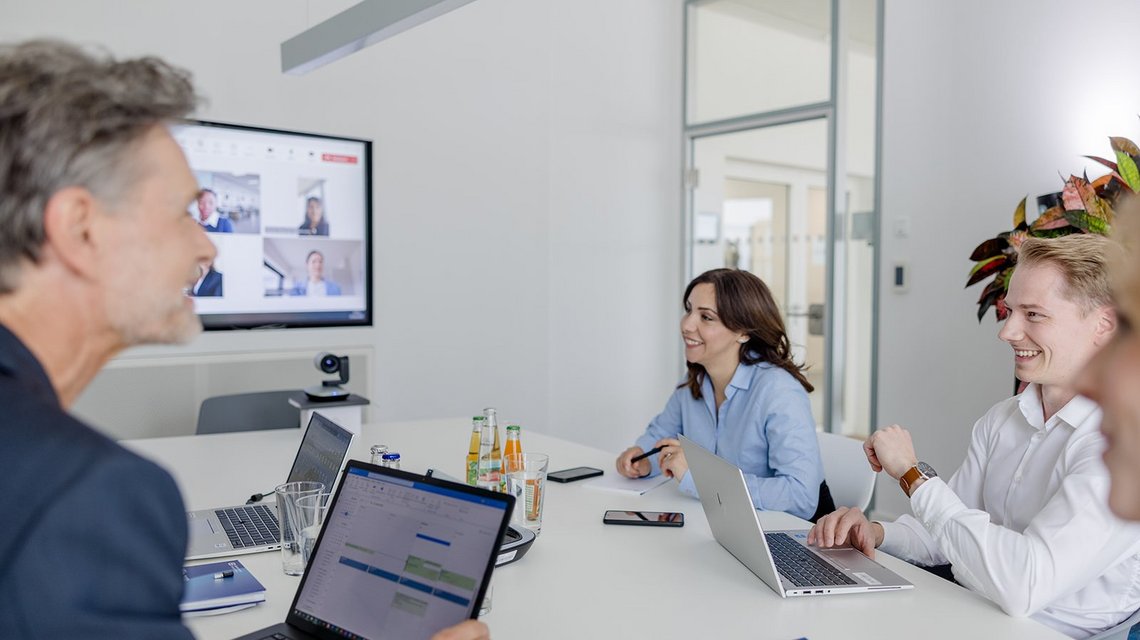 Team during a video conference in office