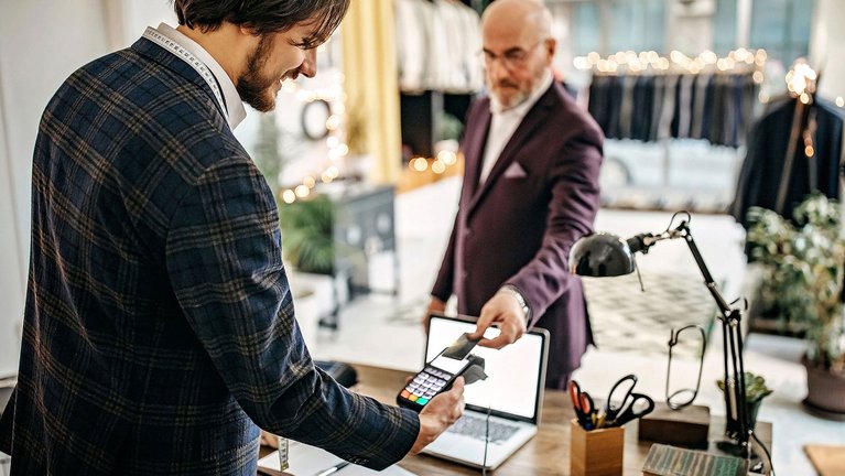 A man pays with his ceramic payment card