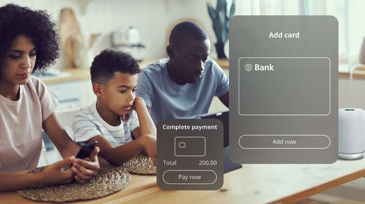 A family engages with digital devices around a table, with a digital payment interface displayed in the foreground showing a transaction option.