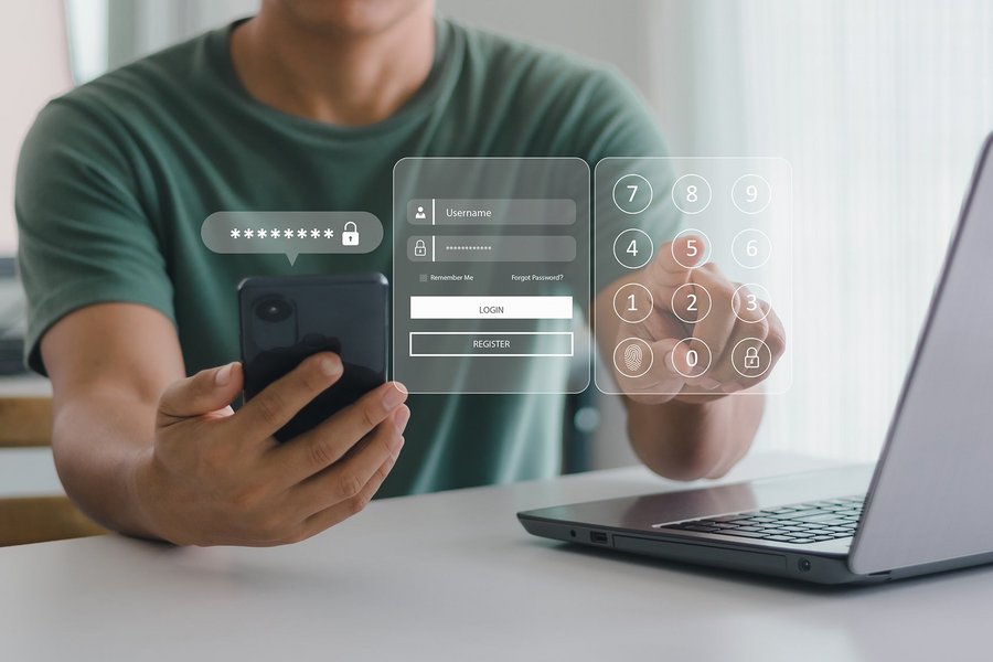 People use smartphones and laptops to log in via digital login forms and security queries.