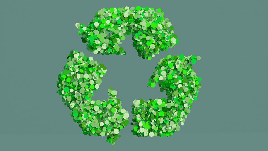 Recycling symbol made from green dots