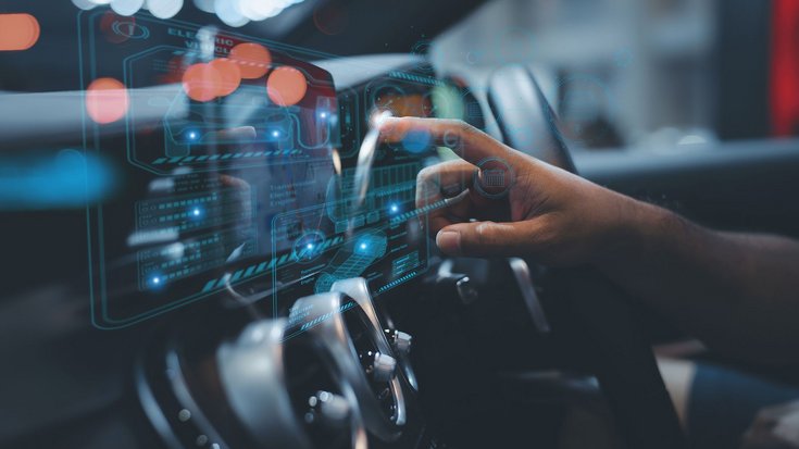 Driver interacting with futuristic car dashboard display