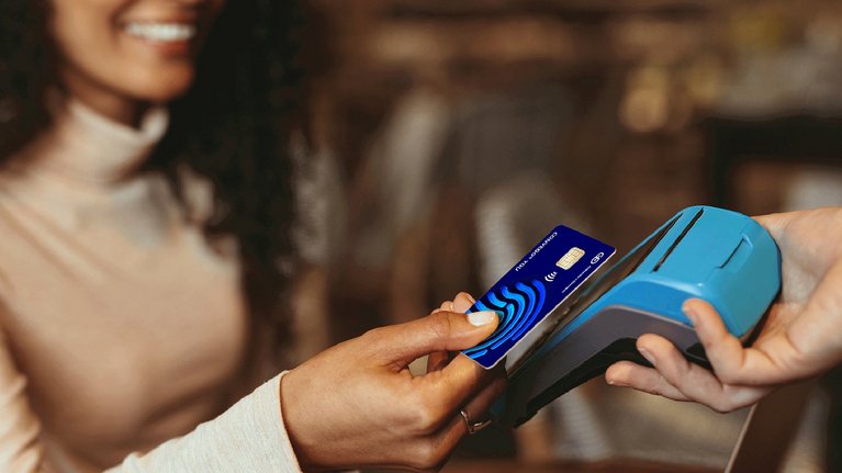 Customer paying with a bank card using a payment terminal