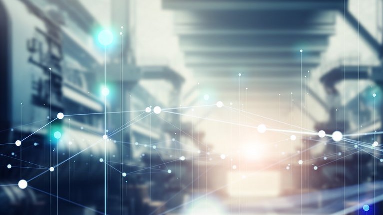 Factory interior with an overlay of a digital network