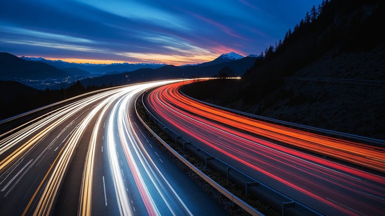 Long exposure of car light trails on a highway at dusk