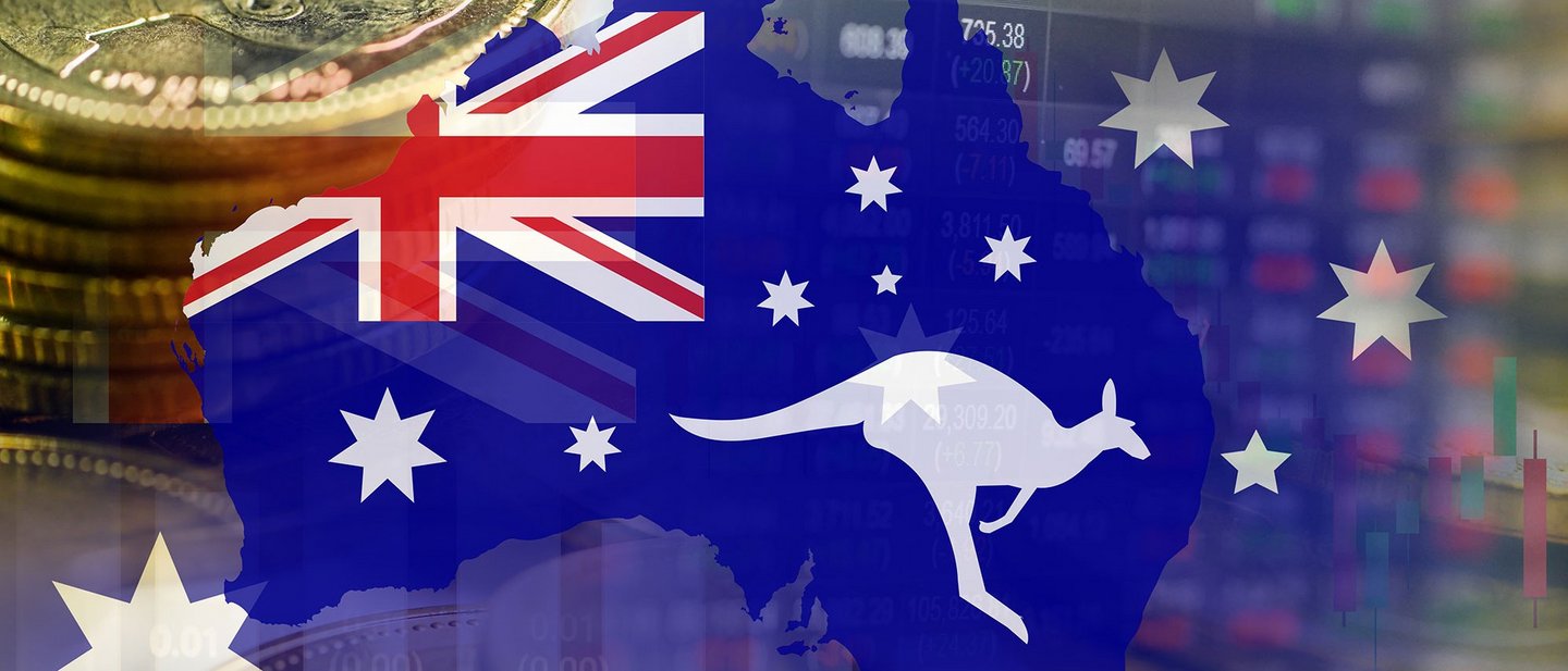 Outline of Australia with its flag, coins, and stock market data in the background.