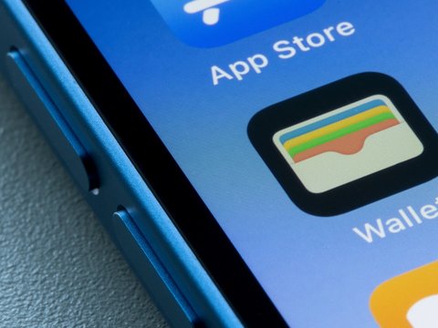 Unlocked iPhone showing the Wallet app, which can be used to manage credit cards or digital assets
