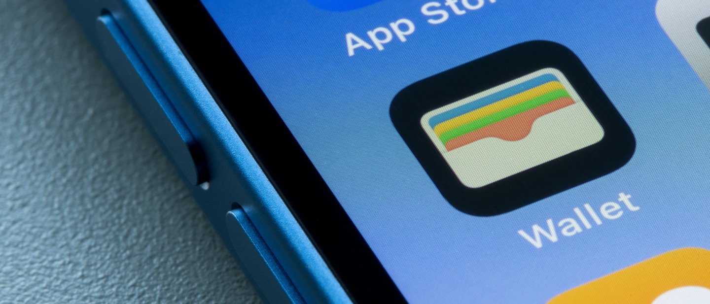 Unlocked iPhone showing the Wallet app, which can be used to manage credit cards or digital assets