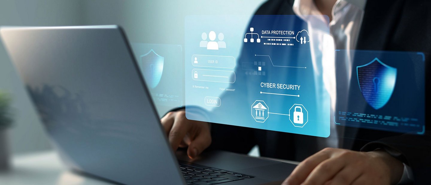 Man using a laptop to securely log into his account, highlighting safe online access and security.