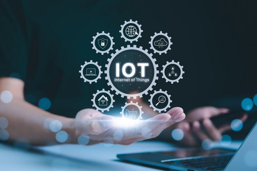 IoT concept features smart devices and technologies, emphasizing connectivity and innovation.