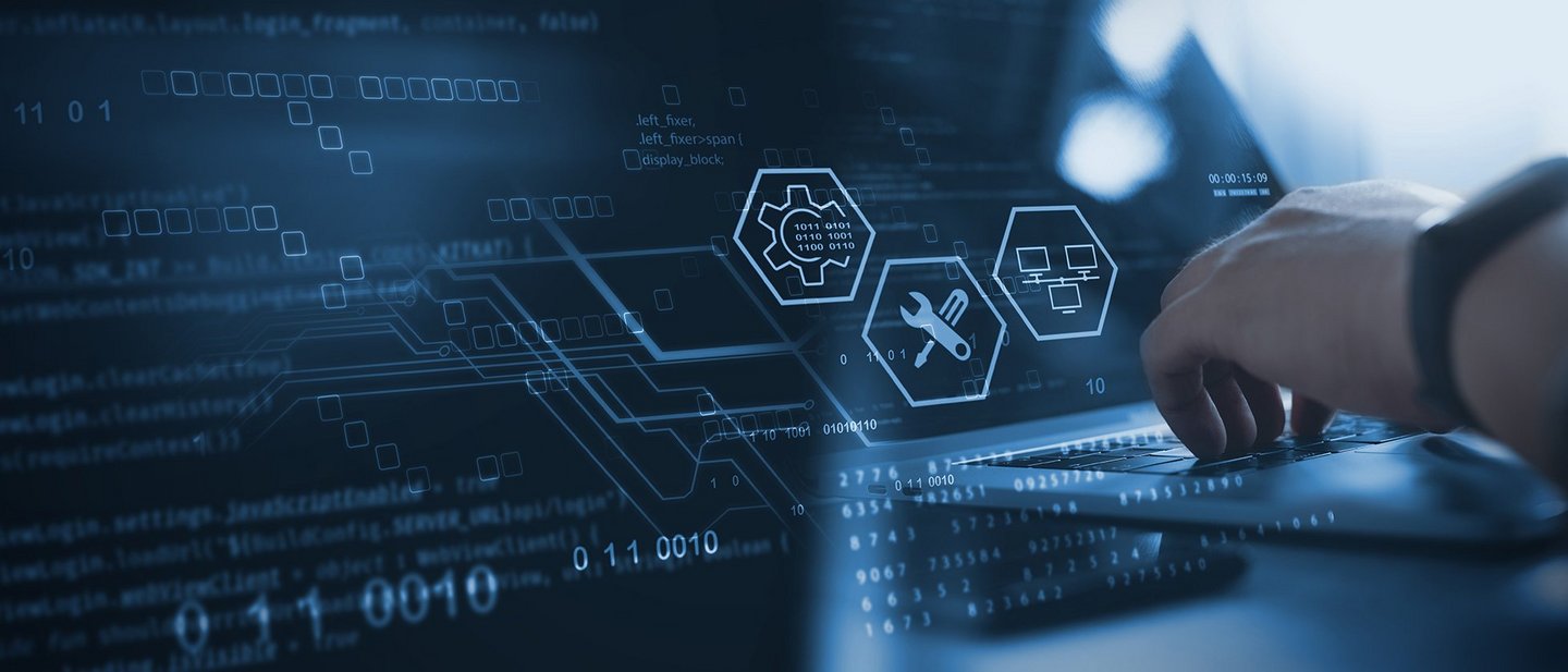 Technician works on laptop to manage database, big data and digital technologies.