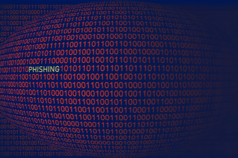 A sphere composed of binary code, with the word "PHISHING" within the code.