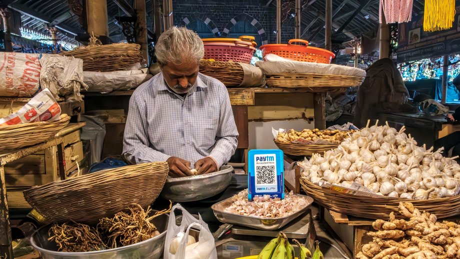 A QR code scanner for digital payments via UPI or Paytm at a vegetable stall at Pune, India.