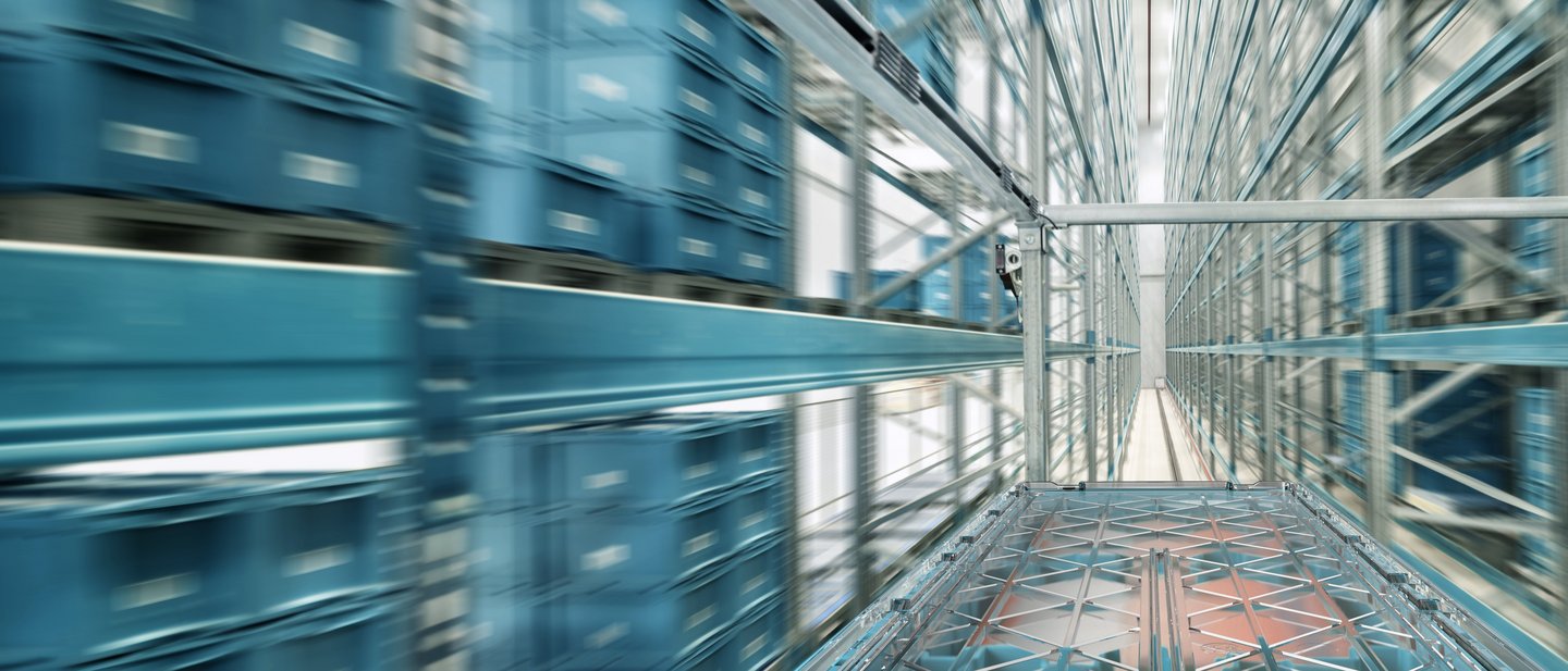 Blurred path between rows of notatray boxes