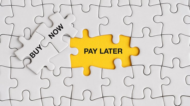Buy now, pay later text on jigsaw puzzle