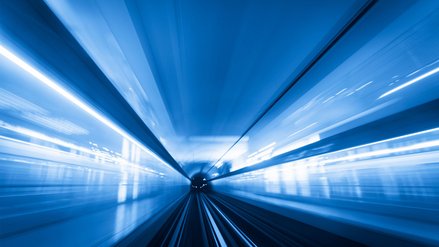 Fast transit - Abstract motion-blurred view from the front of a train  