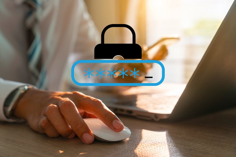 Close up of a hand using his login and password for cybersecurity