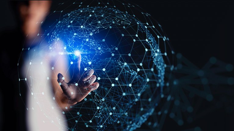 Person pointing at a globe made of a digital network