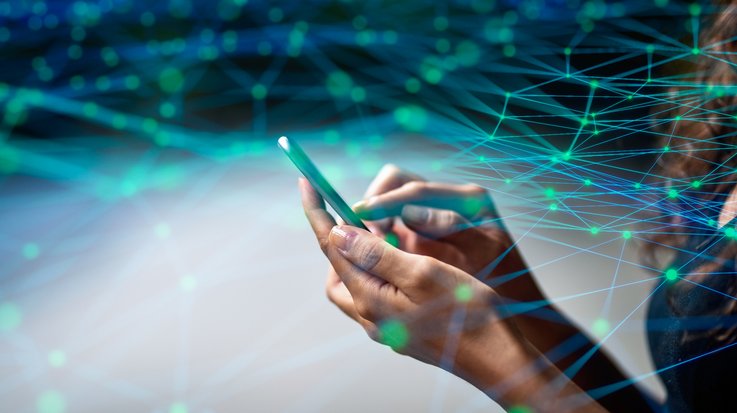 A woman operates her smartphone