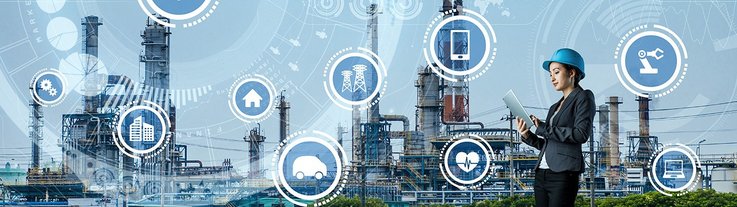 A woman in a hard hat operates a tablet, simulated data streams and symbols for buildings and devices float in the air