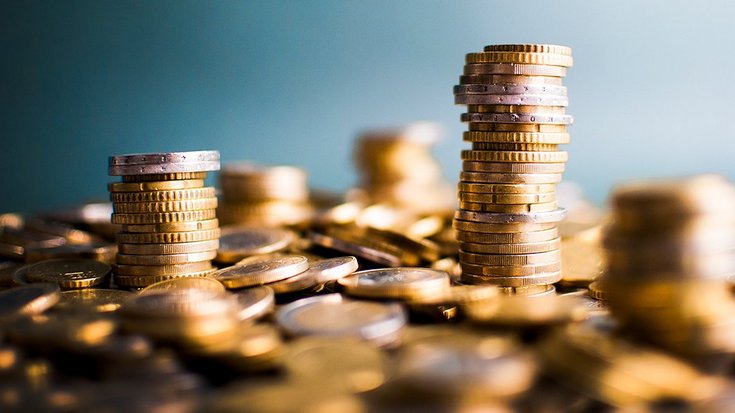 Two towers of euro coins stacked on top of each other