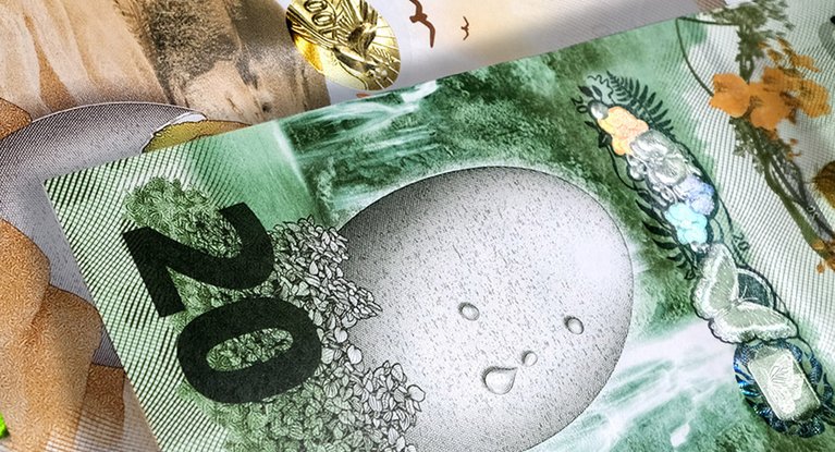 Close up of banknote with value 20 with security features