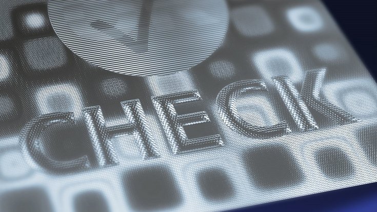 A hologram with a tick and the inscription 'CHECK'.