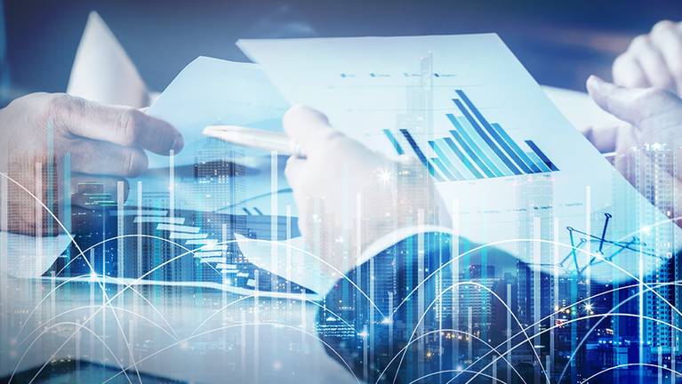 Collage of businessmen discussing various papers and simulated digital diagrams