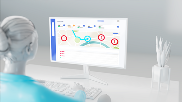 Person at the computer checks alerts of a tracking dashboard