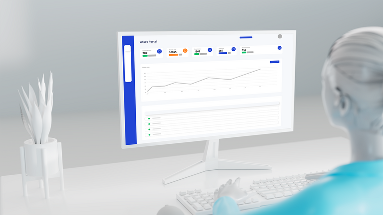 Person at computer reviewing a dashboard