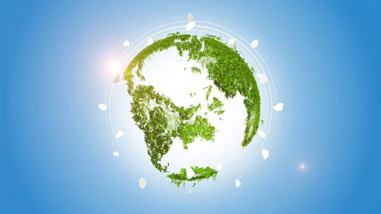 A transparent globe whose continents are made of grass