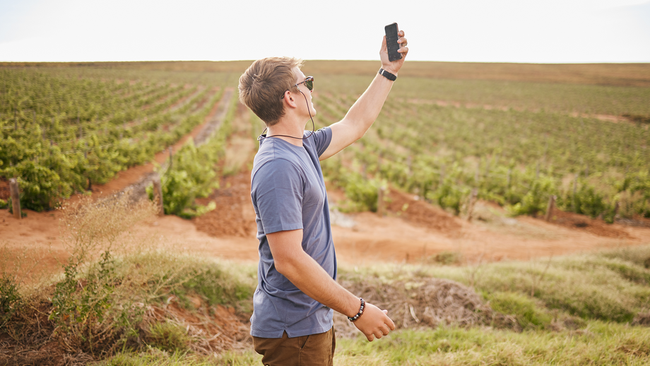 A man tries to get reception with his smartphone