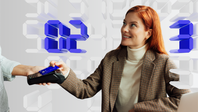 Woman paying with card at terminal