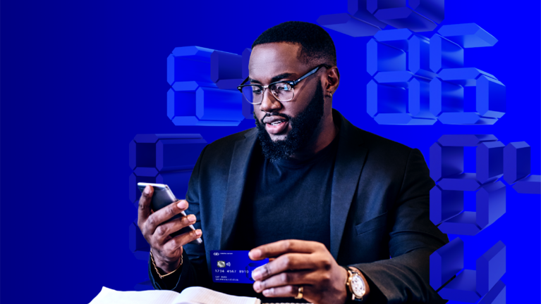 Businessman with smartphone and credit card